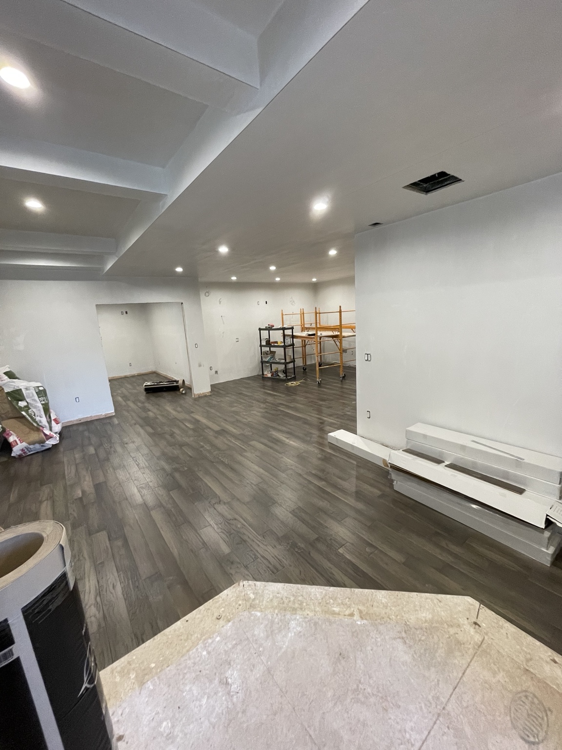 Large interior flooring installation in progress
